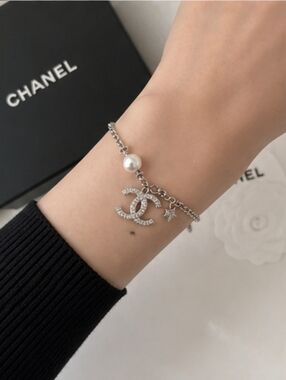 CHANEL Silver-Tone Crystal CC Logo Bracelet with Pearls